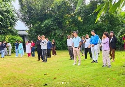 Group photo of participants at Digital Rights Consultation Event and Workshop, doing an activity where everyone is standing